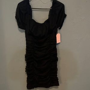 Blāshe black ruffle dress